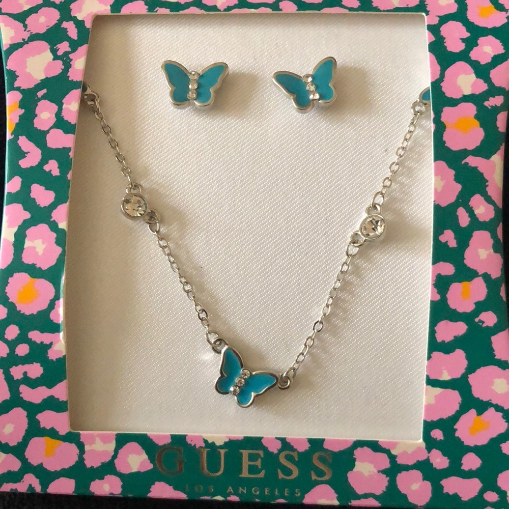 Butterfly earring and necklace set turquoise and silver with diamond accent.
